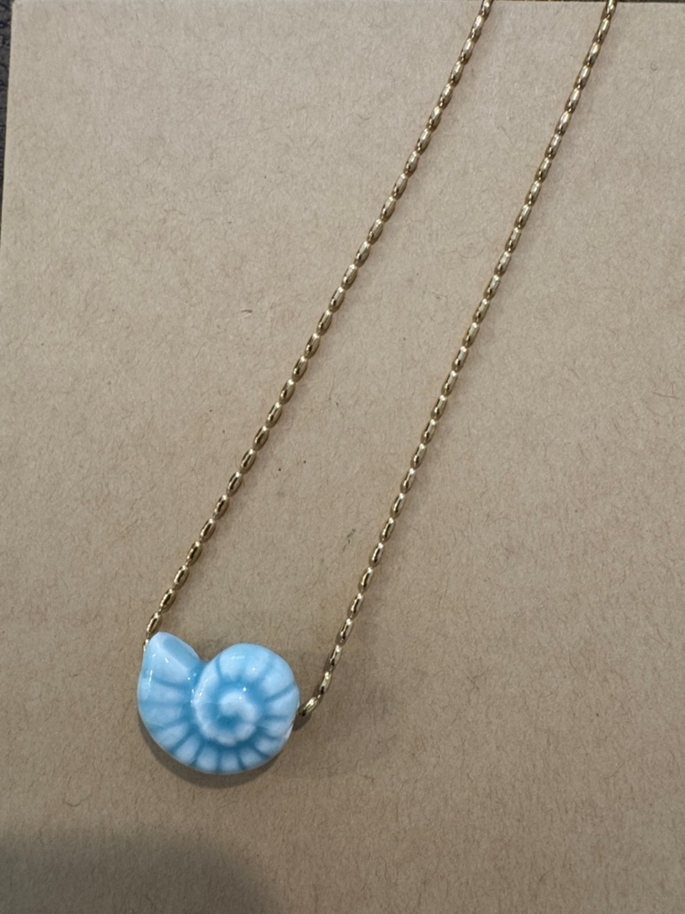 Gold Chain Necklace with Light Blue Spiral Shell Pendant